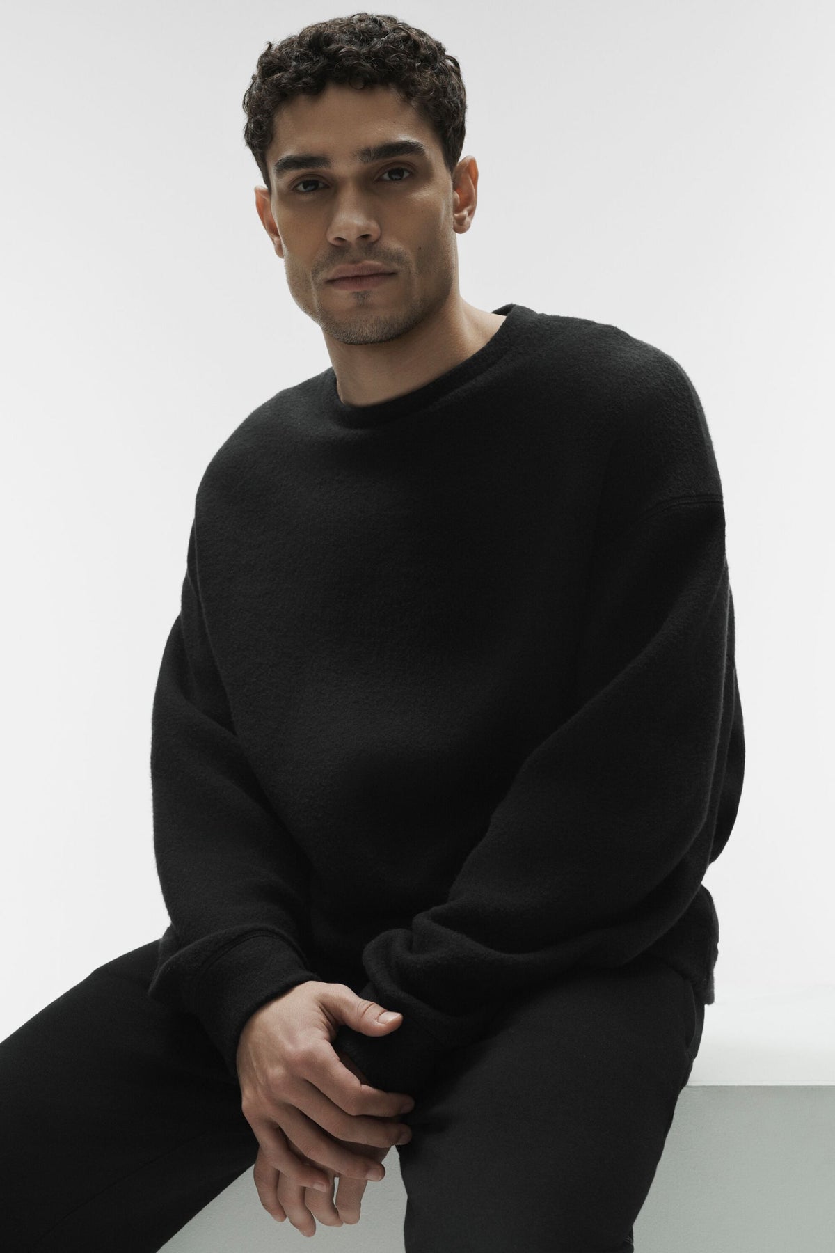 Triumph Restore Crew Neck Sweatshirt - Black product image 1, provided for visual reference and product detail review