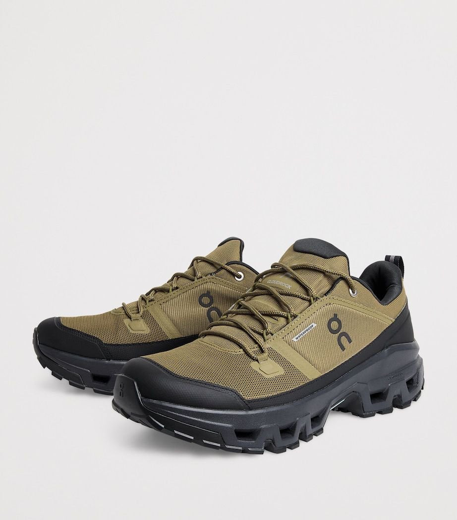 On Cloudrock Low Waterproof Brown/Black Hiking Shoes product image 1, provided for visual reference and product detail review
