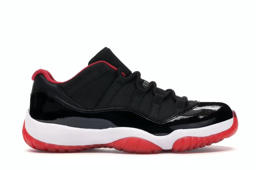 Air Jordan 11 Retro Low Bred (2015) product image 1, provided for visual reference and product detail review