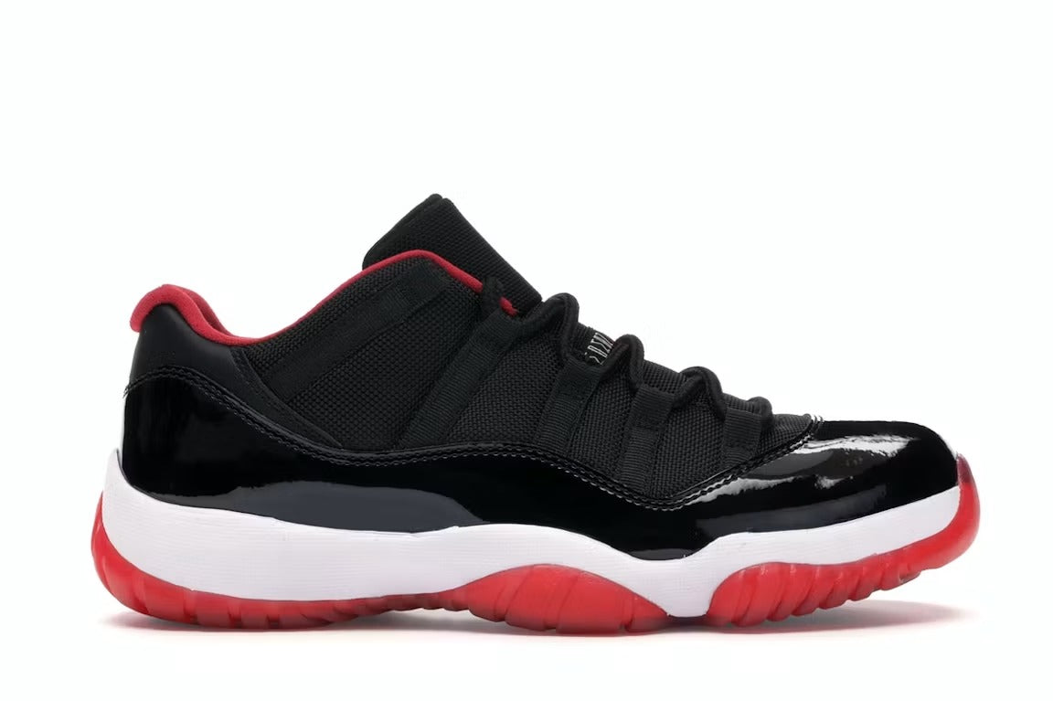 Air Jordan 11 Retro Low Bred (2015) product image 1, provided for visual reference and product detail review
