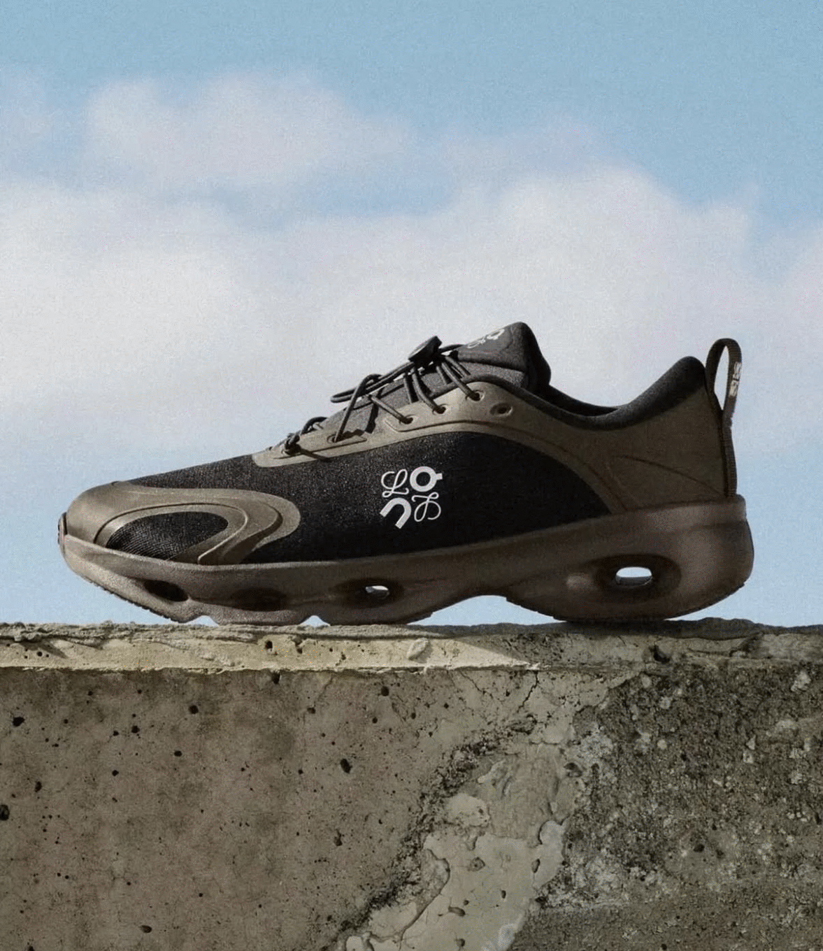 LOEWE x On Cloudsolo Dark Brown Black Lifestyle Sneakers product image 1, provided for visual reference and product detail