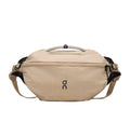 On Sling Pack 9L Sand/Black Crossbody Bag product image 1, provided for visual reference and product detail review